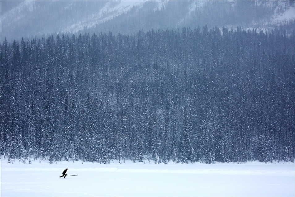 Ice Skating On Frozen Lake Louise in Canada