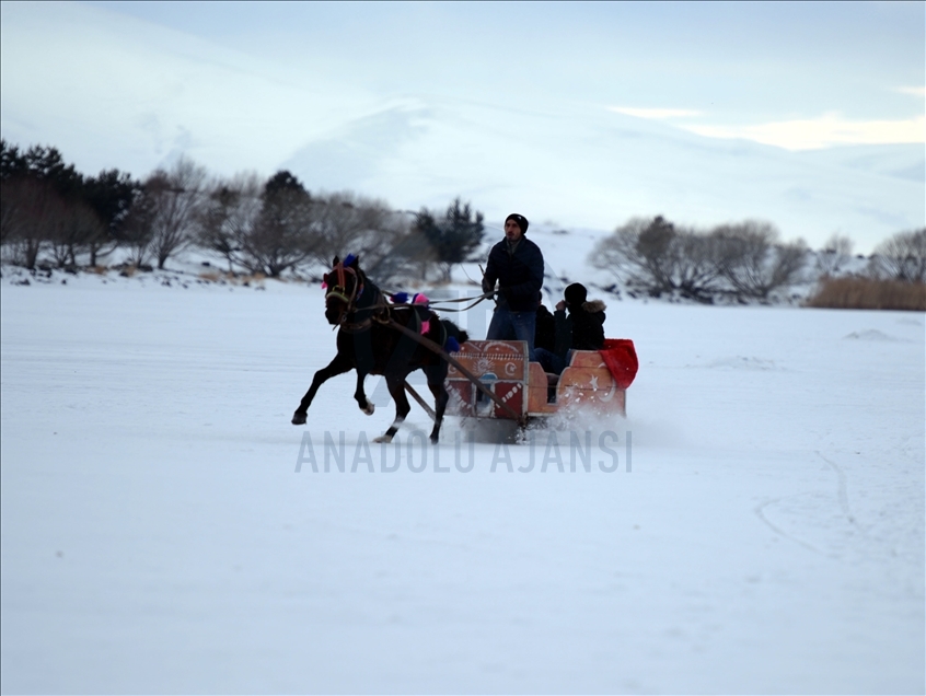 Sleigh and drift pleasure on ice-covered Lake Cildir