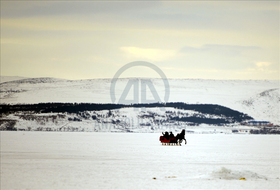 Sleigh and drift pleasure on ice-covered Lake Cildir