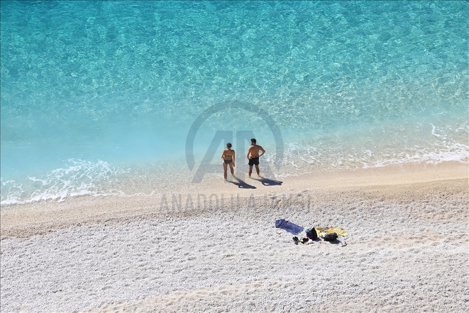 People enjoy beaches and warm weather in Antalya
