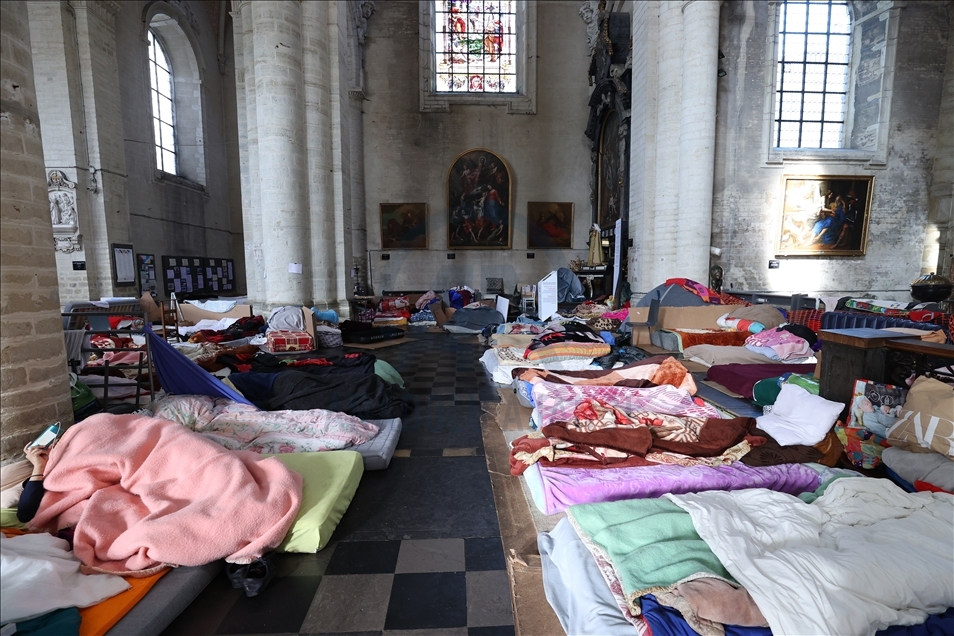 Undocumented migrants in Brussels protest in church