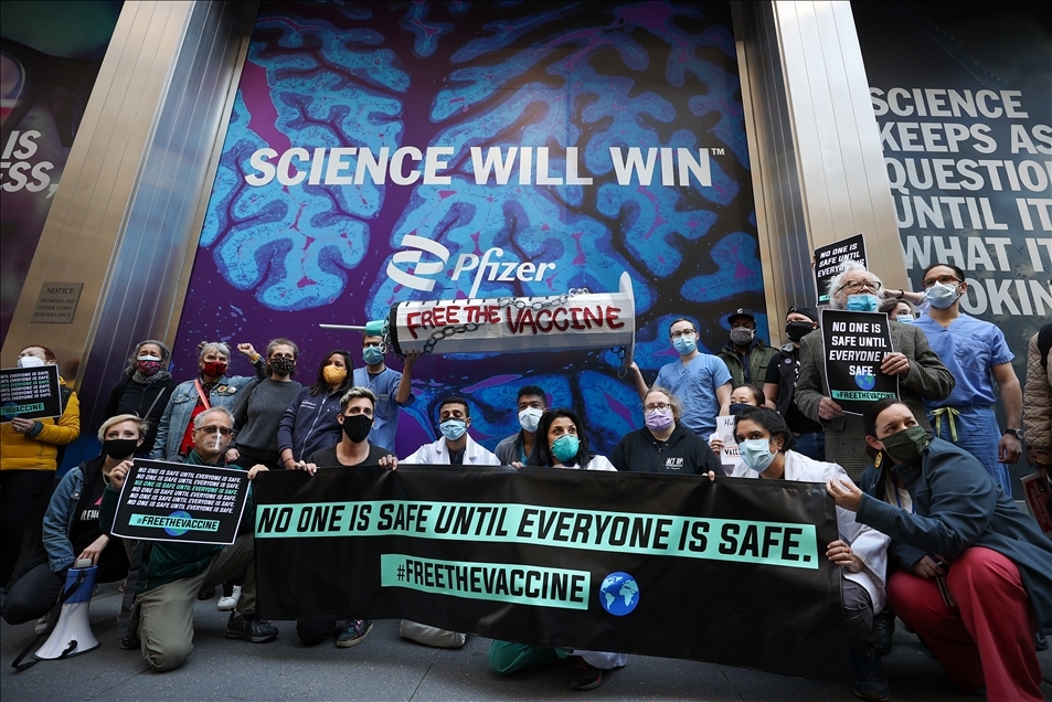 People gather at Pfizer HQ in NYC demanding equitable global vaccine distribution