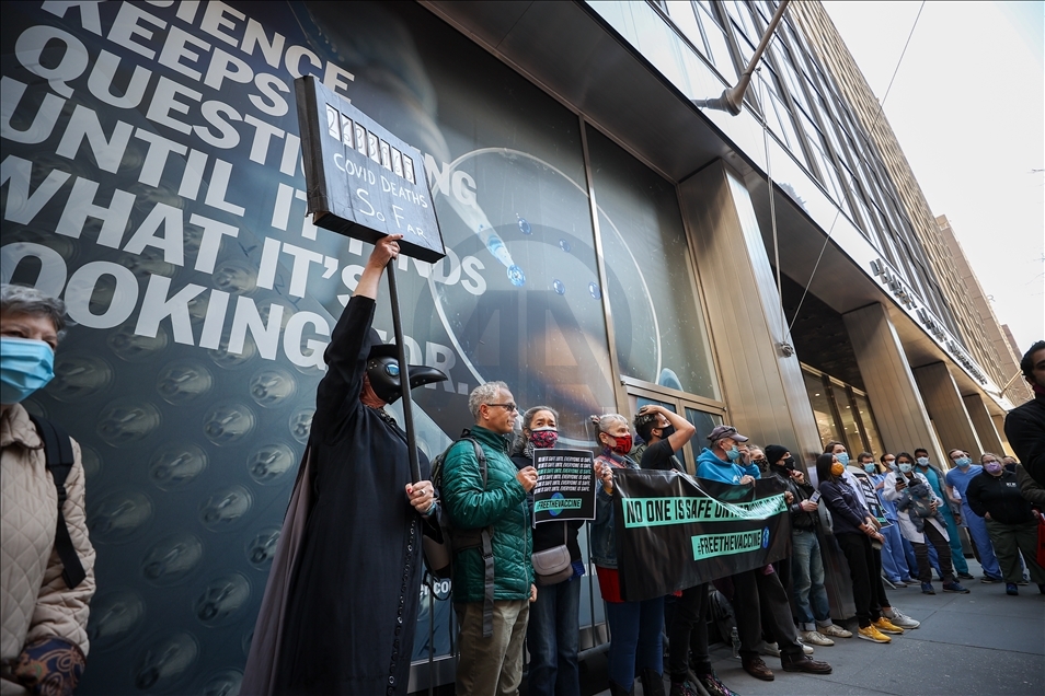 People gather at Pfizer HQ in NYC demanding equitable global vaccine distribution