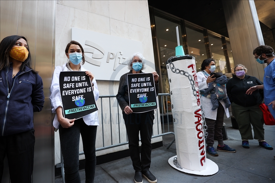 People gather at Pfizer HQ in NYC demanding equitable global vaccine distribution