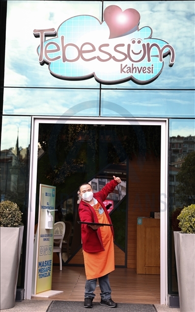Young people with down syndrome raise awareness by working at a cafe in Istanbul
