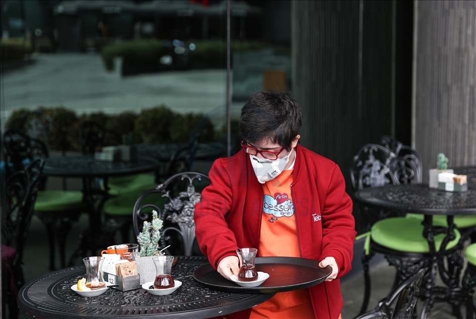 Young people with down syndrome raise awareness by working at a cafe in Istanbul