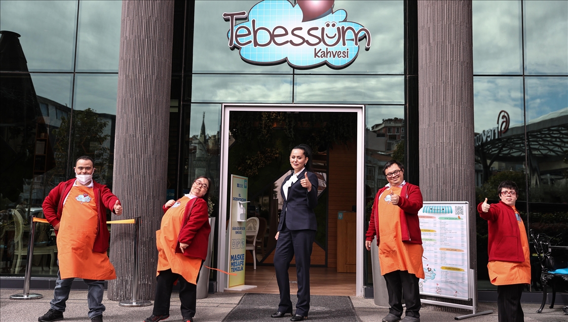 Young people with down syndrome raise awareness by working at a cafe in Istanbul