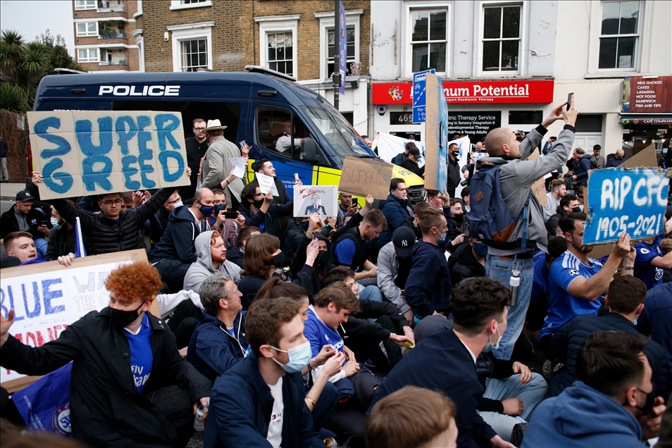 Fans protest European Super League outside Chelsea FC in London