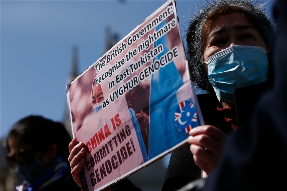 Activists protest outside Parliament as MPs debate China's treatment of Uighur Muslims