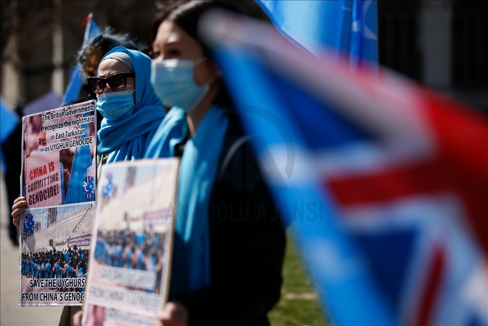 Activists protest outside Parliament as MPs debate China's treatment of Uighur Muslims