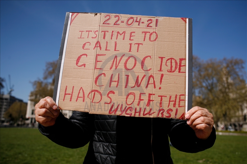 Activists protest outside Parliament as MPs debate China's treatment of Uighur Muslims