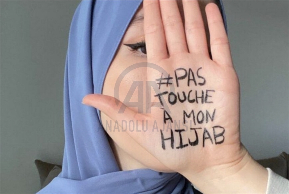 Fransa'da Müslüman kadınlar "Başörtüme dokunma" diyor