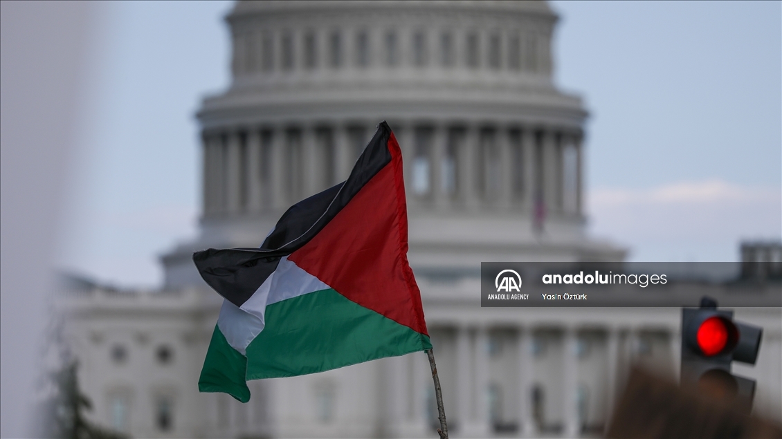 Activists and protesters take part in a rally in support of Palestinians in Washington, DC