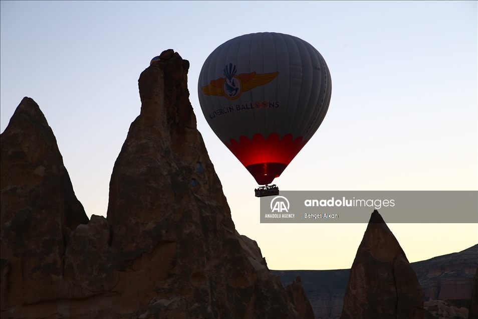 Hot-air balloons glide after full lockdown in Turkey's Nevsehir