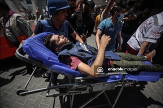 Le caméraman de l'Agence Anadolu, Mohammad Dahlan, a été blessé par des éclats d'obus suite à une attaque de missiles israélienne sur la bande de Gaza.