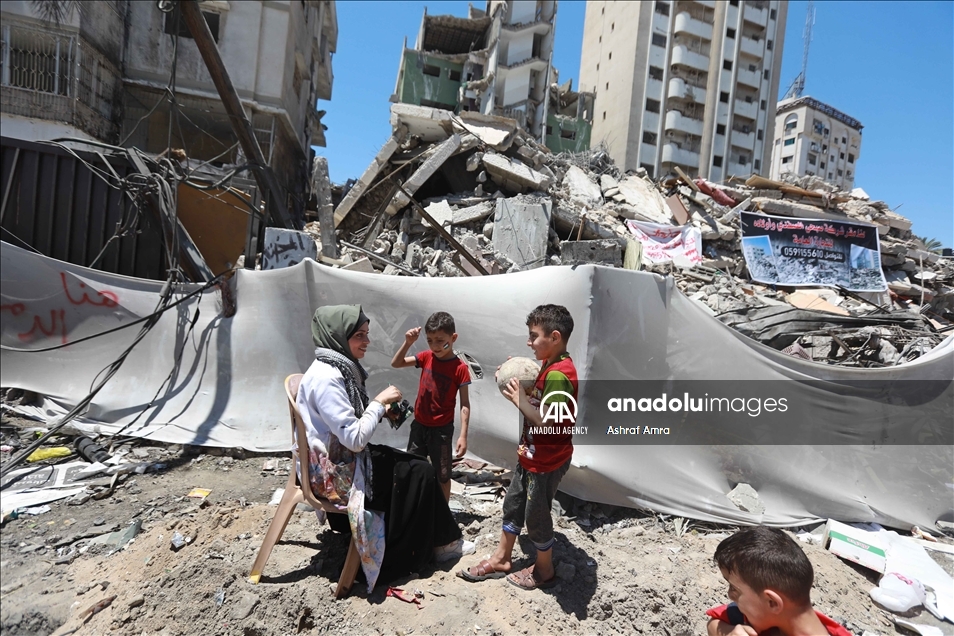 "الشيخ جرّاح" يتجسد على جدار منزل مهدوم بغزة