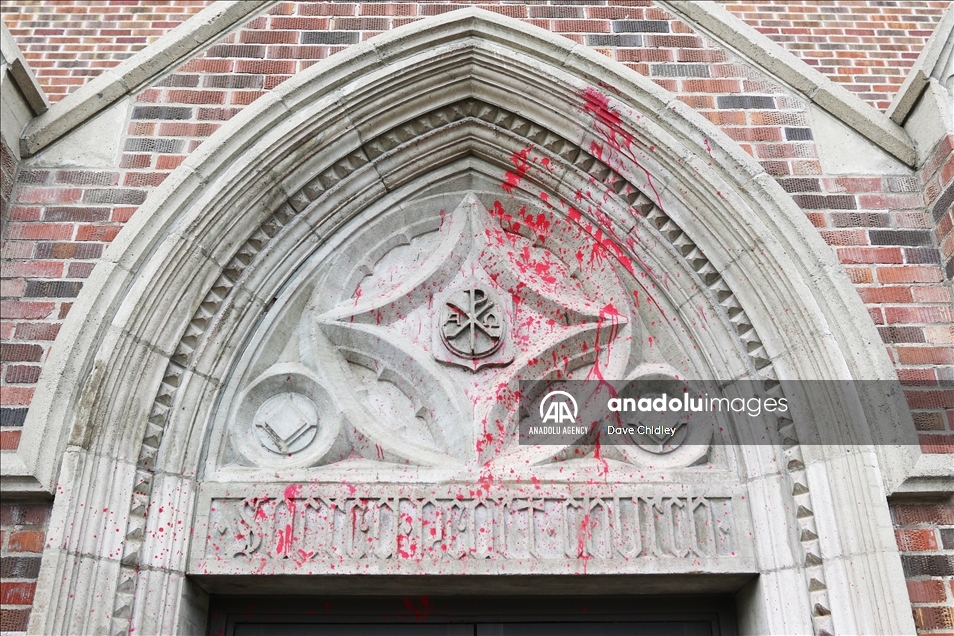 Churches in Canada's Calgary painted with red and orange paint
