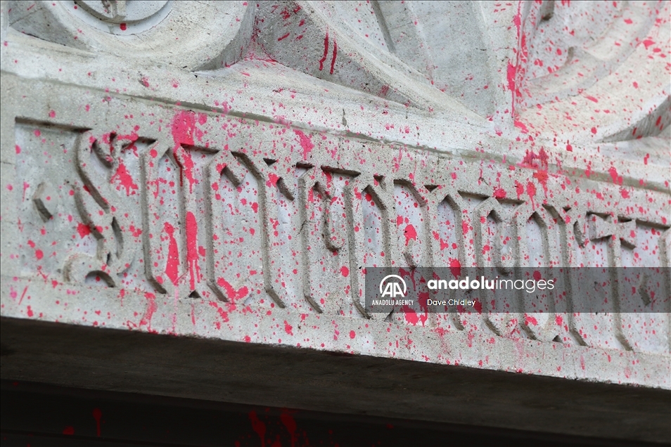 Churches in Canada's Calgary painted with red and orange paint