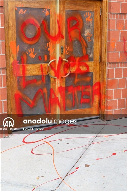 Churches in Canada's Calgary painted with red and orange paint