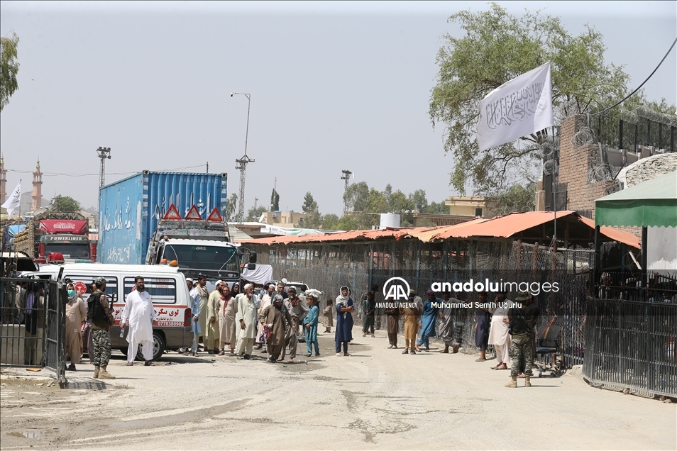 Afghans, who want to flee their country after Taliban’s takeover, are waiting at Torkham border crossing to enter Pakistan