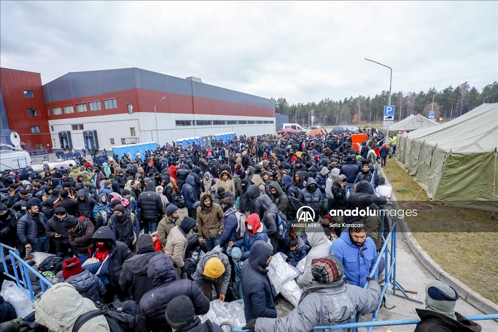 Migrants at Poland-Belarus border move to closed area prepared by Belarusian government