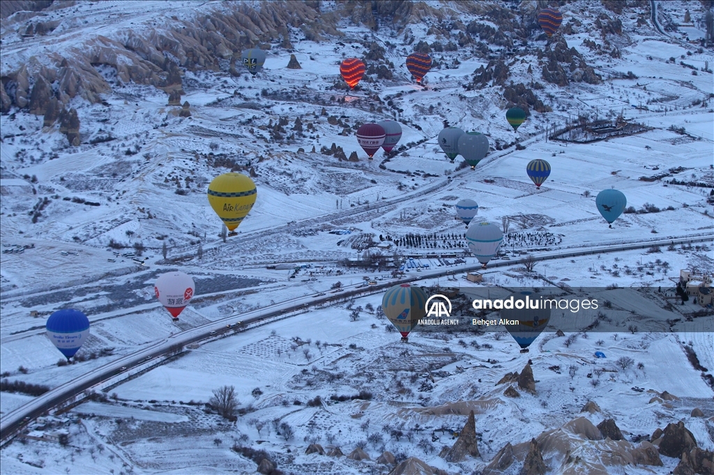 Hot air balloon rides after snowfall in Cappadocia
