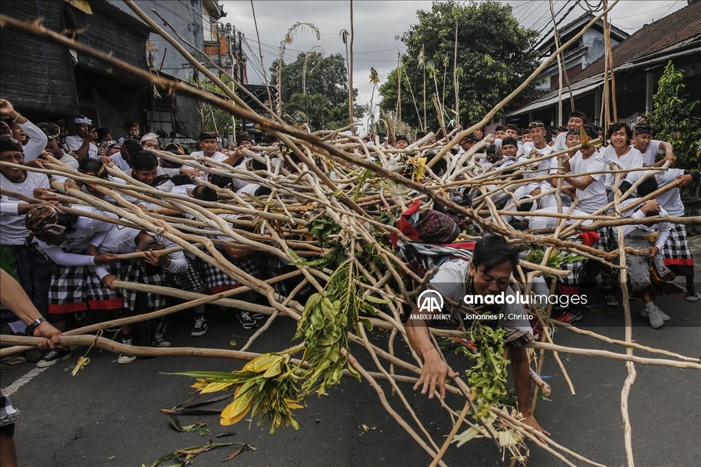 Ritual of Mekotek to reject bad luck in the village in Bali