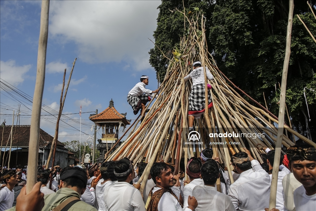 Ritual of Mekotek to reject bad luck in the village in Bali