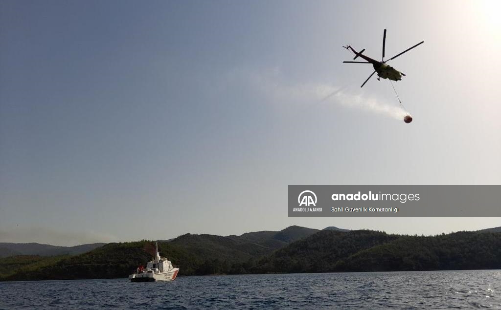 Marmaris'te yanan ormanlık alanda soğutma çalışmaları sürüyor