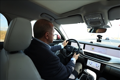 Turkish President Recep Tayyip Erdogan test-drives country's first home-grown car