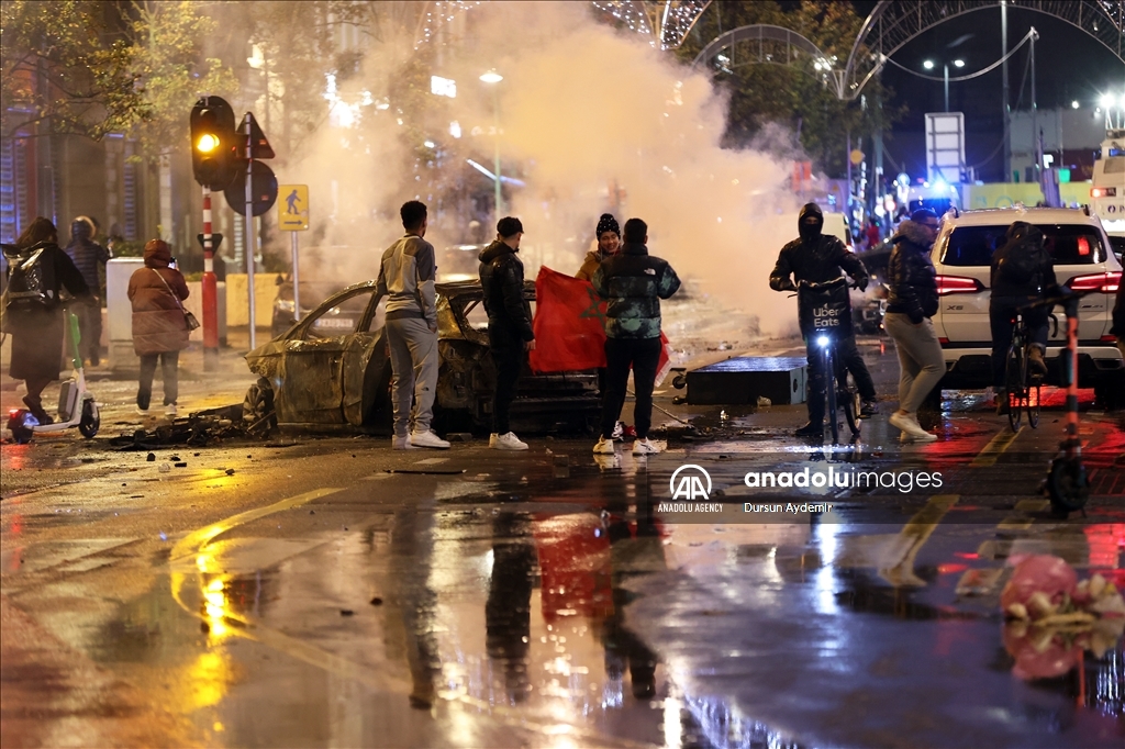 Police take measure to disperse crowd after tension break out in Brussels following Morocco’s win against Belgium