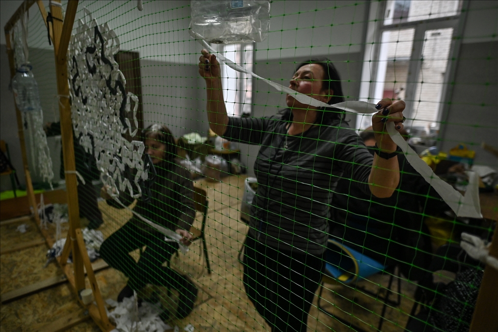 Ukrainians weave camouflage nets for the Ukrainian army