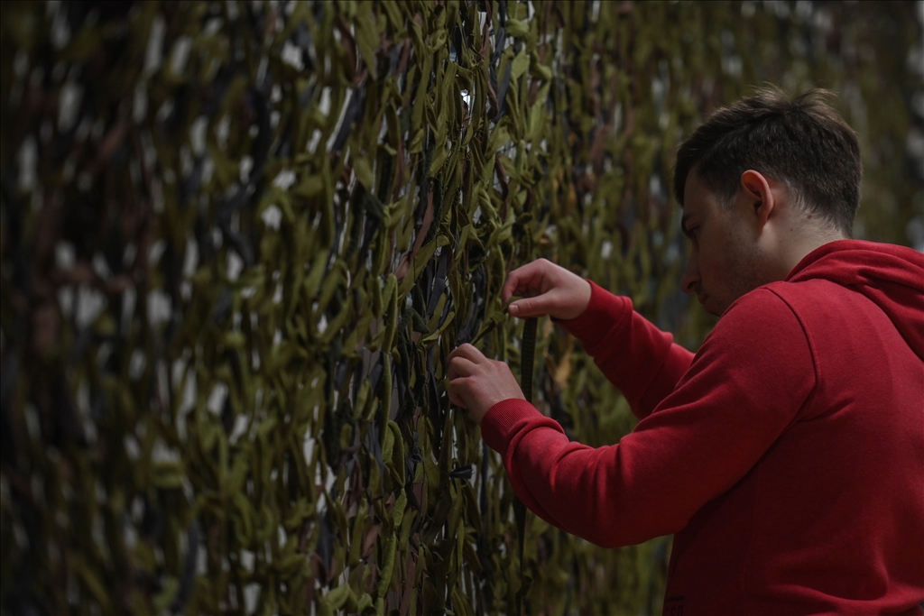 Ukrainians weave camouflage nets for the Ukrainian army
