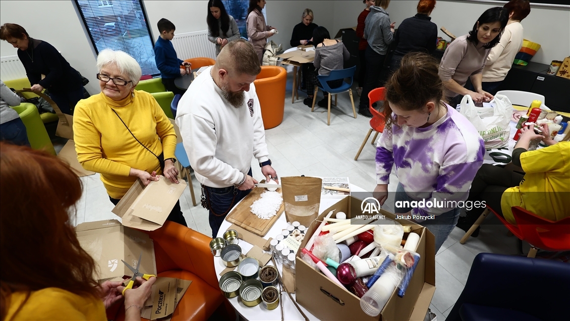 People in Poland make trench candles for Ukrainian soldiers