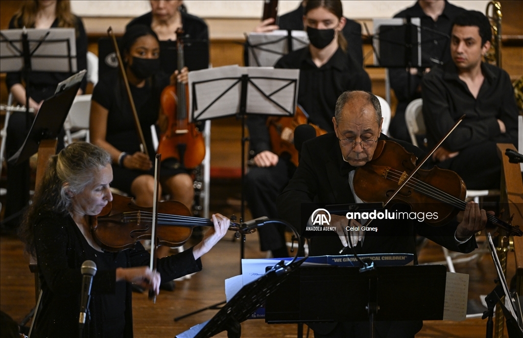 Turkish violinist Osman Kivrak performs at a fundraising concert for Türkiye quake victims in Washington