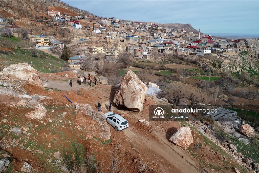 Massive stone rolled from the mountain being tangent to Alidam village in Adiyaman