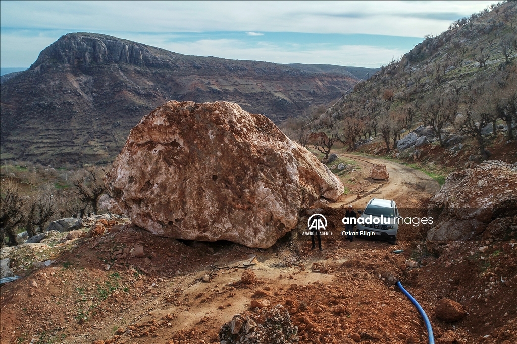 Massive stone rolled from the mountain being tangent to Alidam village in Adiyaman