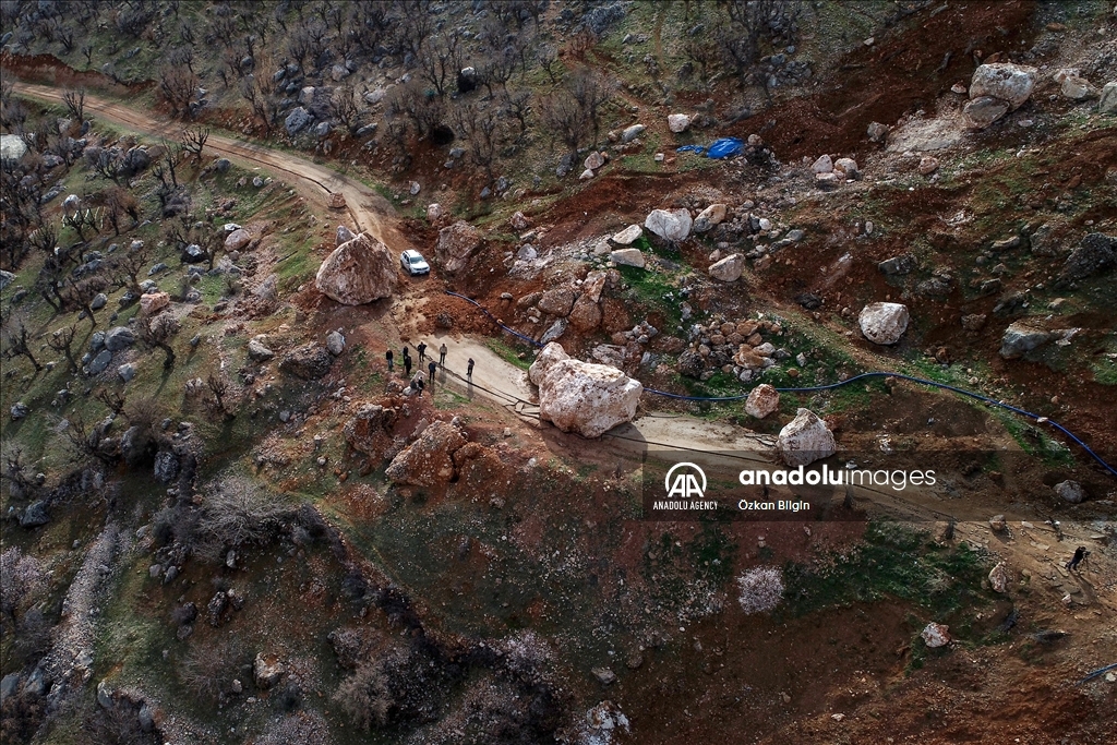 Massive stone rolled from the mountain being tangent to Alidam village in Adiyaman