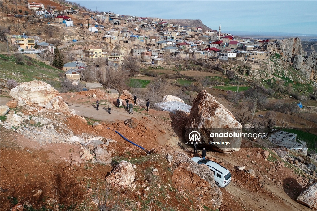 Massive stone rolled from the mountain being tangent to Alidam village in Adiyaman