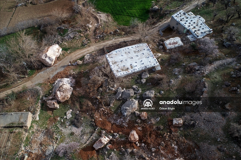 Massive stone rolled from the mountain being tangent to Alidam village in Adiyaman