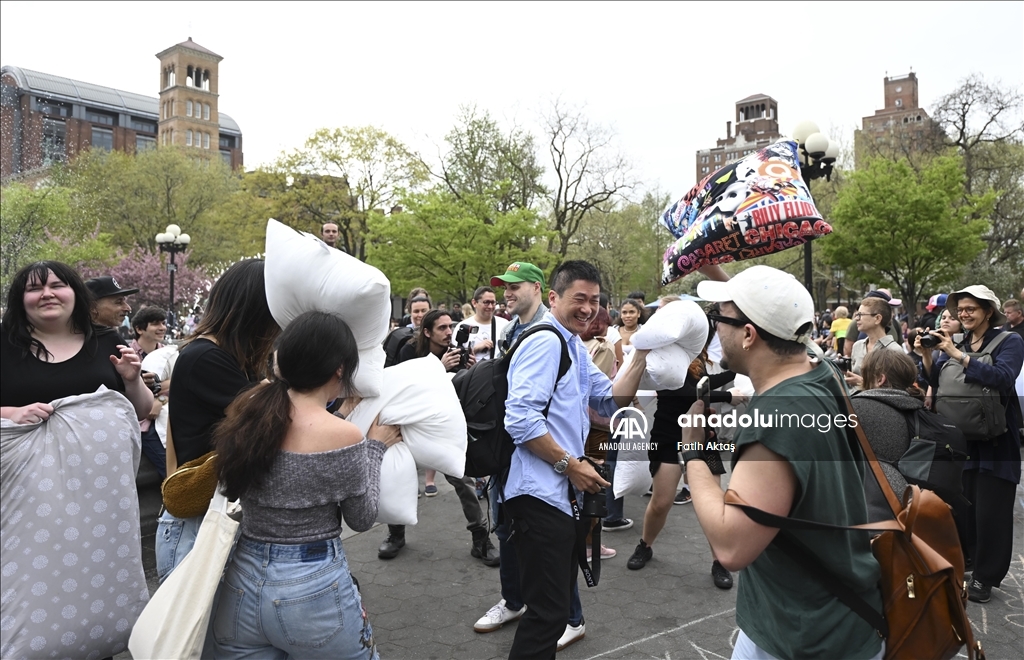 Pillow wielders pummel each other in New York's Washington Square Park on 'International Pillow Fight Day'