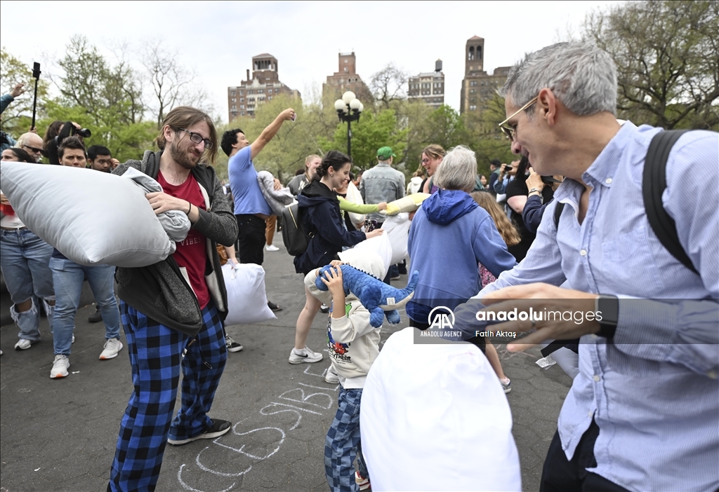 Pillow wielders pummel each other in New York's Washington Square Park on 'International Pillow Fight Day'