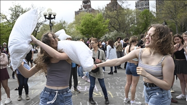 Pillow wielders pummel each other in New York's Washington Square Park on 'International Pillow Fight Day'