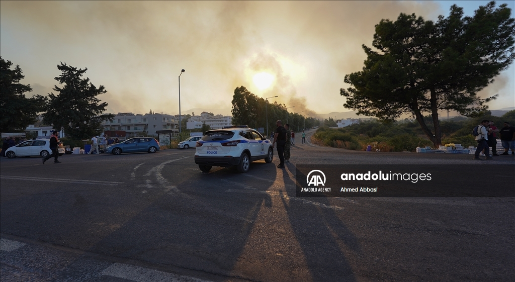 Greece continues fight against wildfires on islands of Rhodes