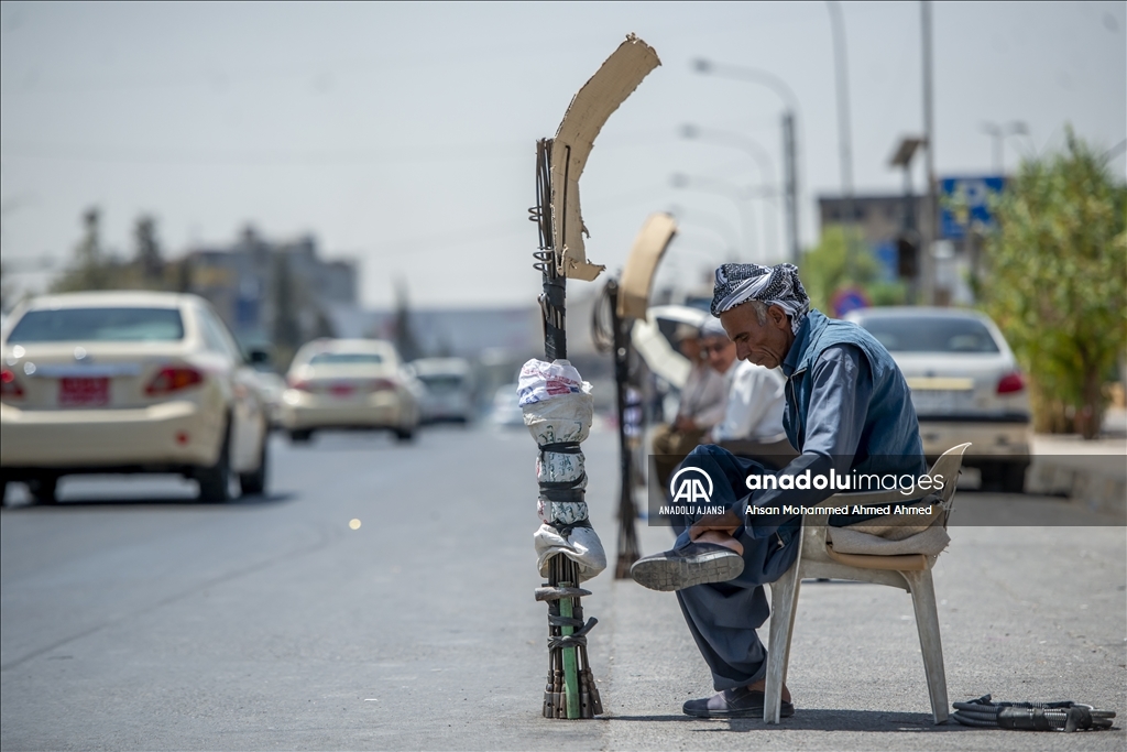 Erbil'de gündelik işçiler 45 dereceyi aşan kavurucu sıcaklarda ekmek parası peşinde koşuyor