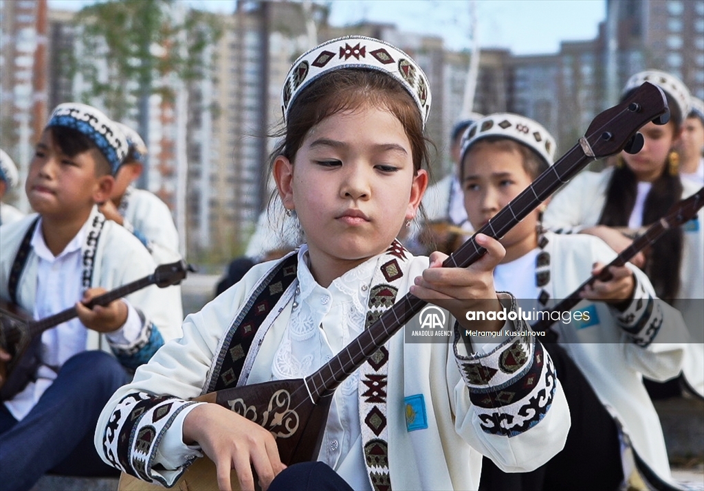 Kazakh singer and music teacher Ibragim Eskendir gives dombra lessons in Astana