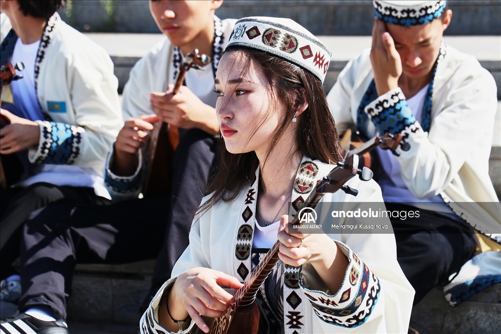 Kazakh singer and music teacher Ibragim Eskendir gives dombra lessons in Astana