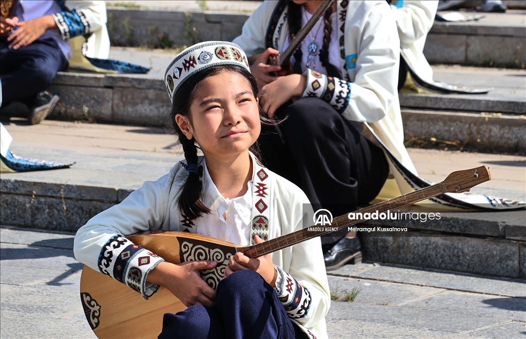 Kazakh singer and music teacher Ibragim Eskendir gives dombra lessons in Astana