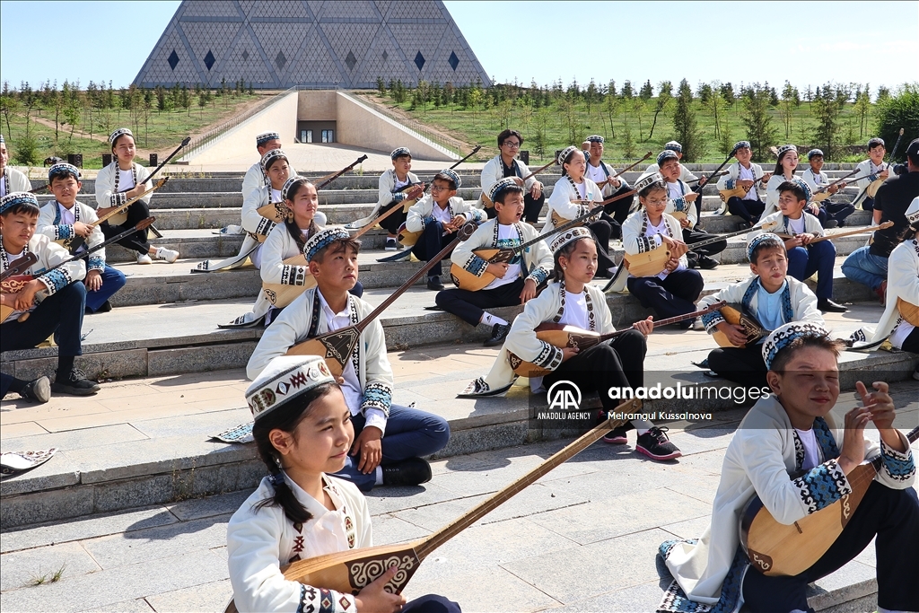 Kazakh singer and music teacher Ibragim Eskendir gives dombra lessons in Astana