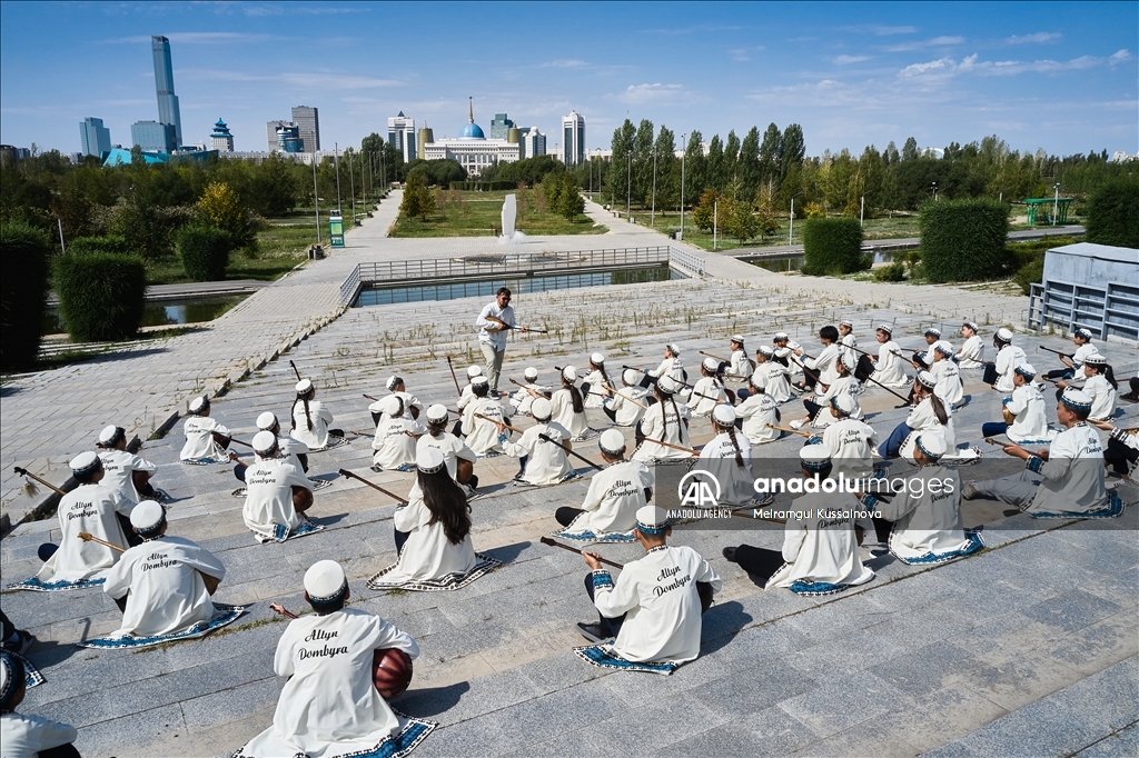 Kazakh singer and music teacher Ibragim Eskendir gives dombra lessons in Astana